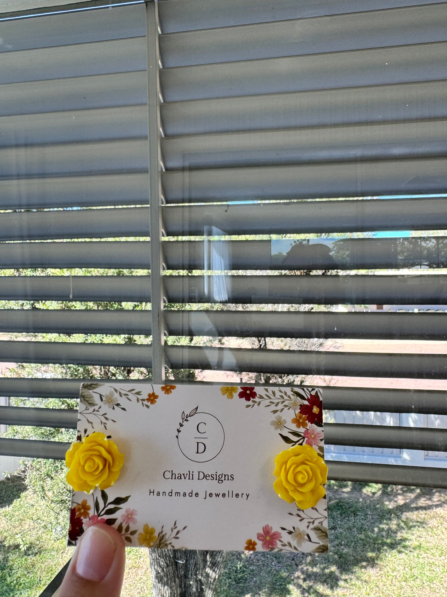 Large flower in yellow earrings