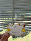 Dainty flower earring in yellow